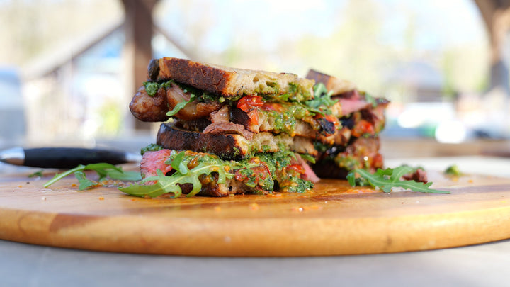 Wood-Fired Steak Sandwich with Homemade Pesto & Roasted Vine Tomatoes